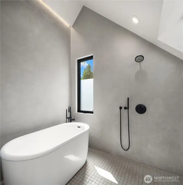 Soaking tub with skylights and dramatic ceiling angles. Tadelakt plaster walls add an organic aesthetic to the spa setting. As a plus, it's low maintenance! Soaking tub with skylights and dramatic ceiling angles. Tadelakt plaster walls add an organic aesthetic to the spa setting. As a plus, it's low maintenance!