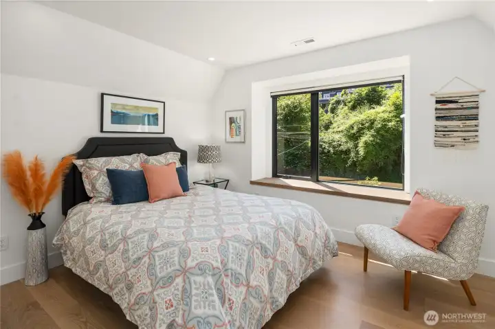 Upstairs bedroom has large closet and window seat. Upstairs bedroom has large closet and window seat.