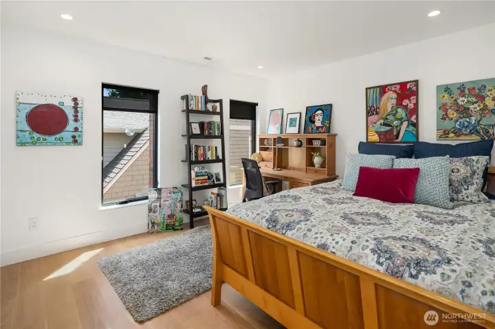 Upstairs bedroom has large closet and a view of Mt Rainier. Upstairs bedroom has large closet and a view of Mt Rainier.