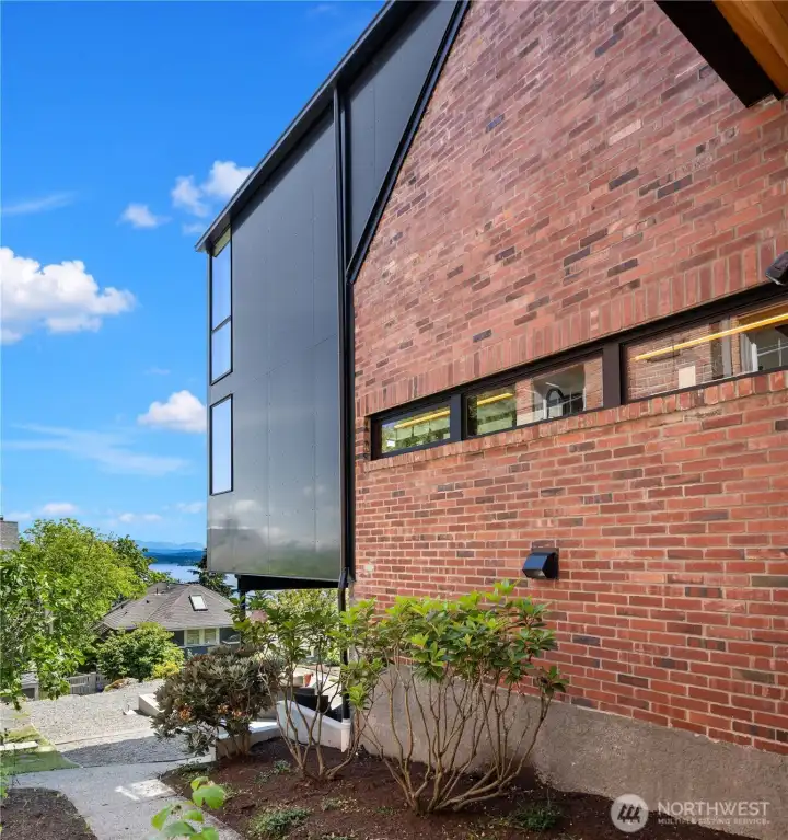 The steel addition plays well with the original brick exterior. The steel addition plays well with the original brick exterior.