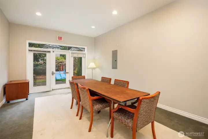 Dining area of Clubhouse including view of children's playground outside