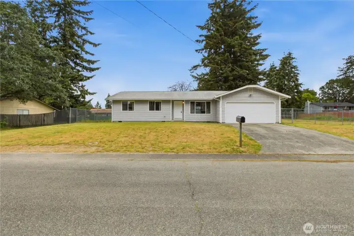 Large two-car garage with generous, wide paved driveway and extra off-street parking! Large two-car garage with generous, wide paved driveway and extra off-street parking!