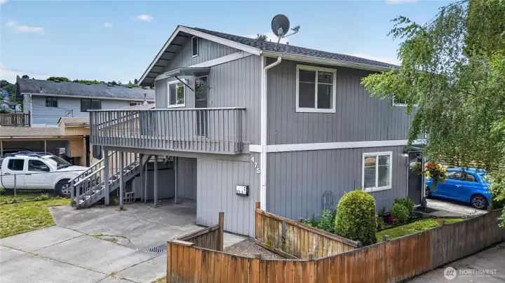 Unit B private deck and entry with off-street parking below
