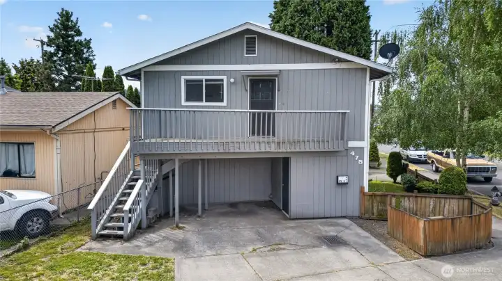Unit B private deck and entry with off-street parking below