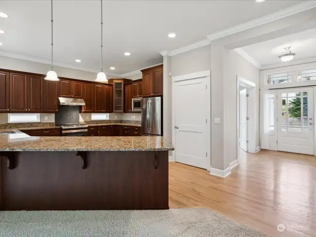 Enjoy your morning coffee from the breakfast bar as the morning light streams in the oversized windows.