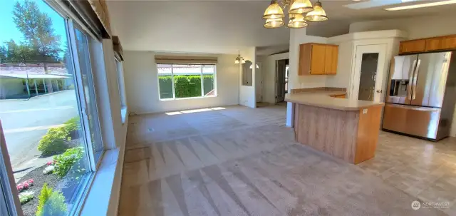 Open concept living room & dining room.
