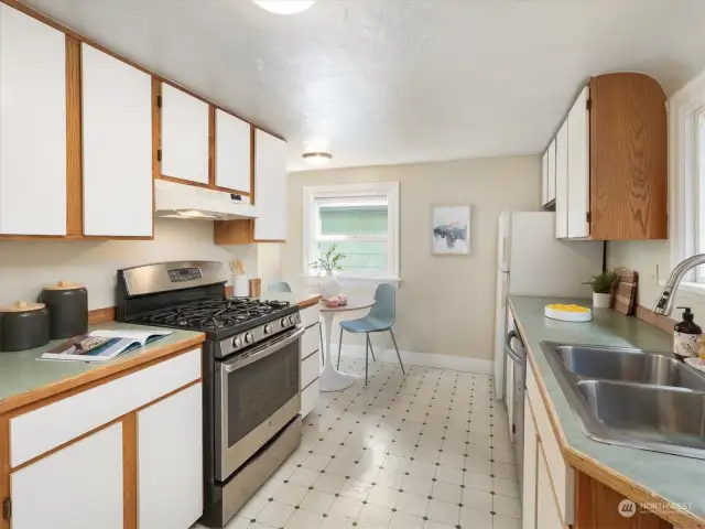 Unit A: Galley style kitchen with ample storage.