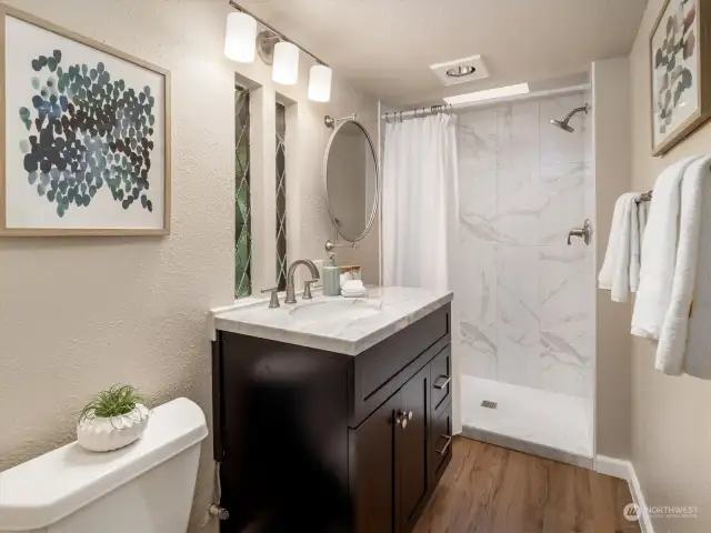 Unit B Bathroom is recently remodeled in Jan 2024 and never been used! Features stainglass windows and skylight in shower.