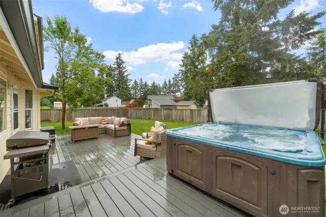 Back Deck: Hot Tub stays with the home