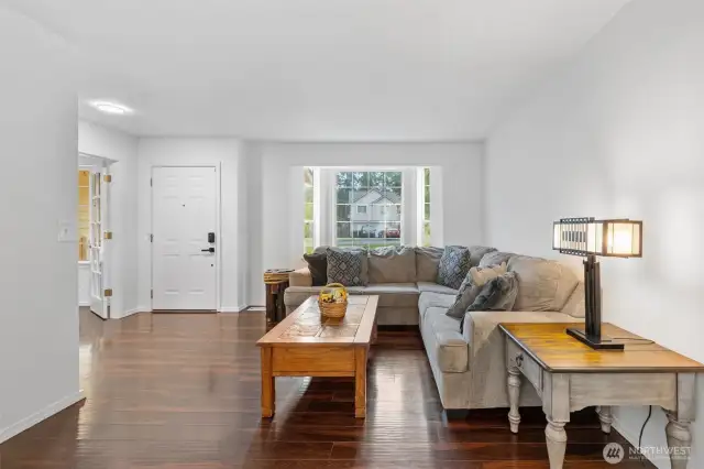 Living Room, Front Door on left, Den/Office Space far left