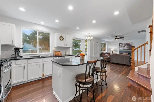 Kitchen on left, Family Room, Stairs to second floor on right