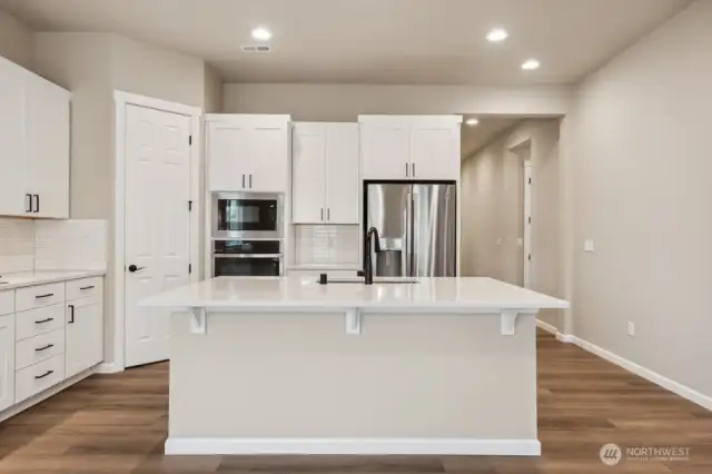 Photos are of a similar home and floorplan.