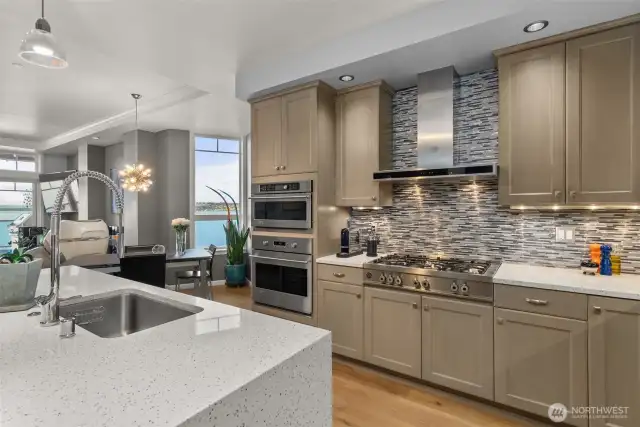 Bertazzoni Cooktop and Hood- Full height backsplash, Granite countertops, GE Monogram oven, convection and microwave