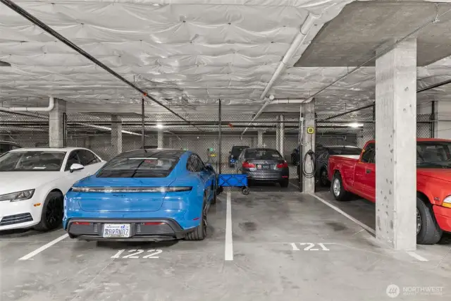 3 total spaces for parking inside the garage, 121 can be used for electric vehicles. 122 and 33 are the other spots