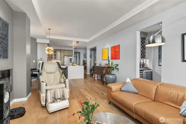The doorway at the immediate right leads to foyer for the built-in beverage area and the Primary Bedroom
