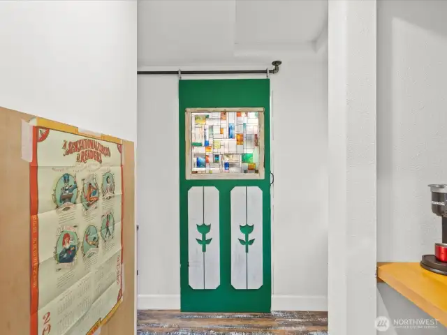 Pantry area off the kitchen with custom doors