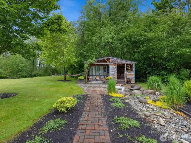 Step outside to another large covered entertaining area