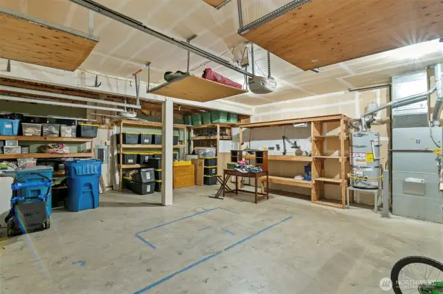 Huge 3 car garage with built in storage.