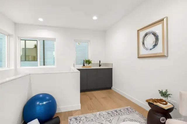 Elevate your evenings with a stylish wet bar and dining area. Perfect for intimate dinners or lively cocktail hours.