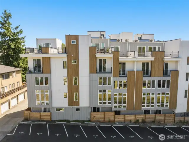 Yes, parking! The builder has paid for 5-years of leased onsite parking in the lot next door!