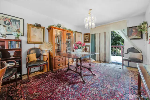 Large dining room with slider to large back deck