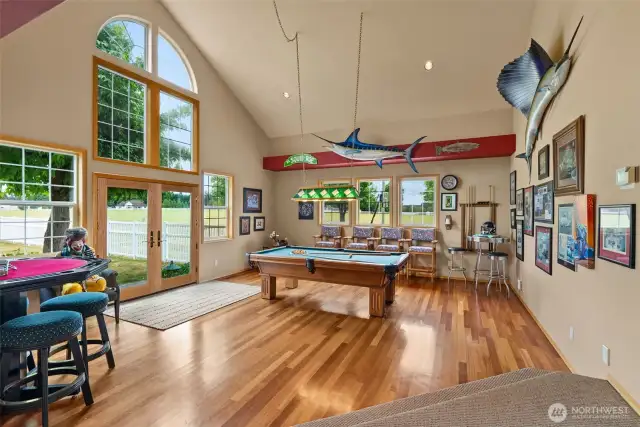 Game/billiard room with brand new french doors leading to the backyard. Perfect for outdoor gatherings!