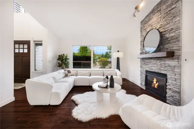Vaulted living room with cozy gas fireplace