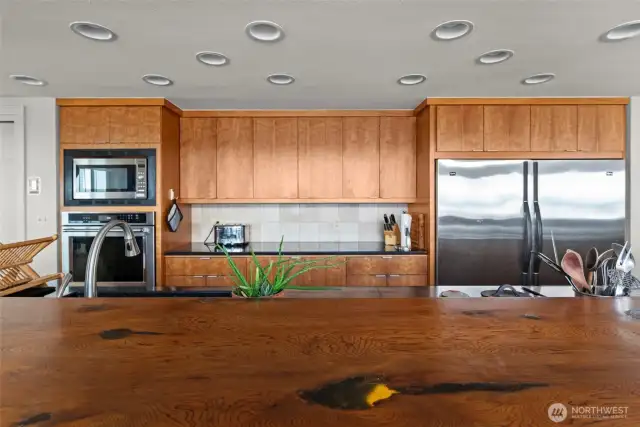 Beautiful cherry cabinets and new appliances.