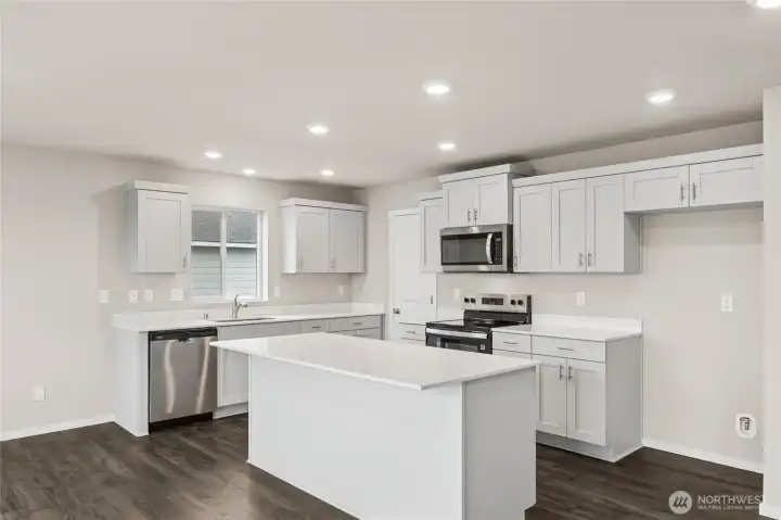 Generous open kitchen.  Pictures are for representational purposes only. Materials and colors may vary,