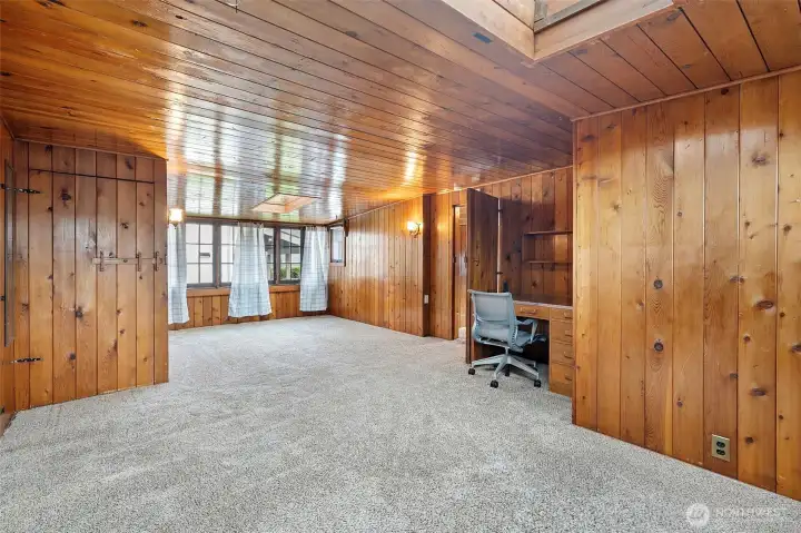 Spacious upstairs bedroom with built-in desk