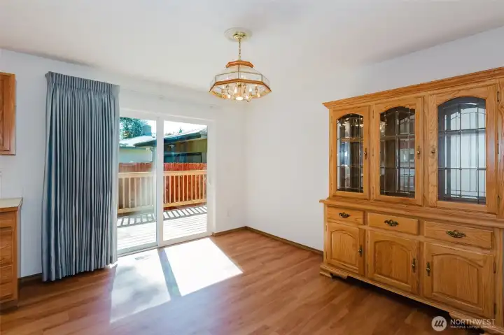 Slider off of dining space leads to oversized deck