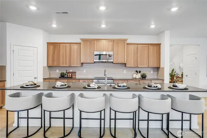 Staged photos are of model home