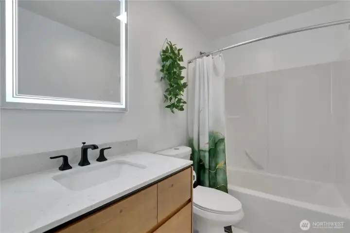 Remodeled full guest bath.
