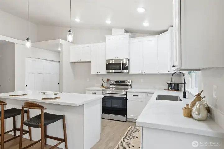 Entertainer’s kitchen with open layout and island seating