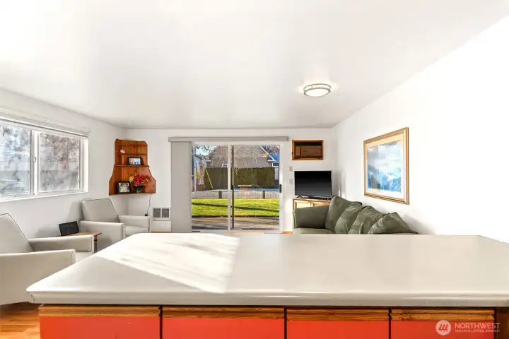 The layout is ideal for indoor/outdoor entertaining, allowing the cook to enjoy company while preparing meals.