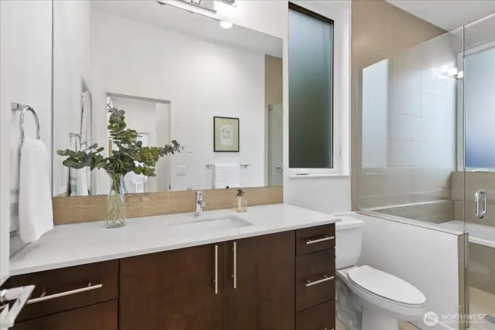 Second floor full bath features fantastic modern finishes.