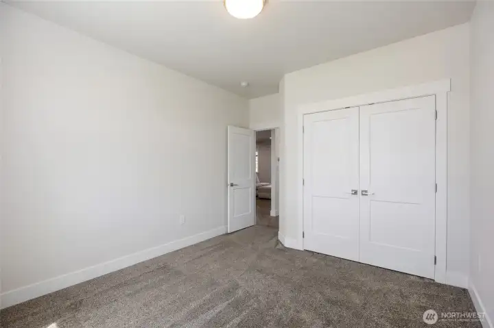 Bedroom 1 (front of house) closet has built-in shelving