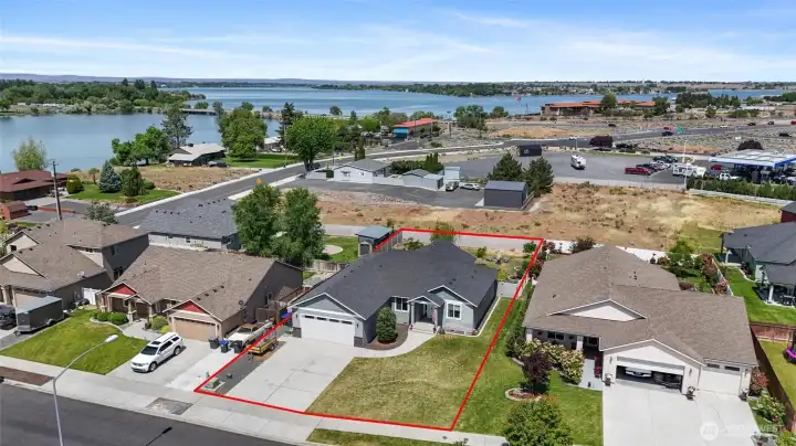 Lot lines are approximate. Lot size is 11,673 square feet! Look at the size of that driveway!