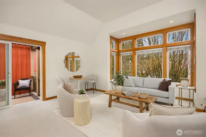 Vaulted ceilings invite natural light and create a bright, welcoming atmosphere.