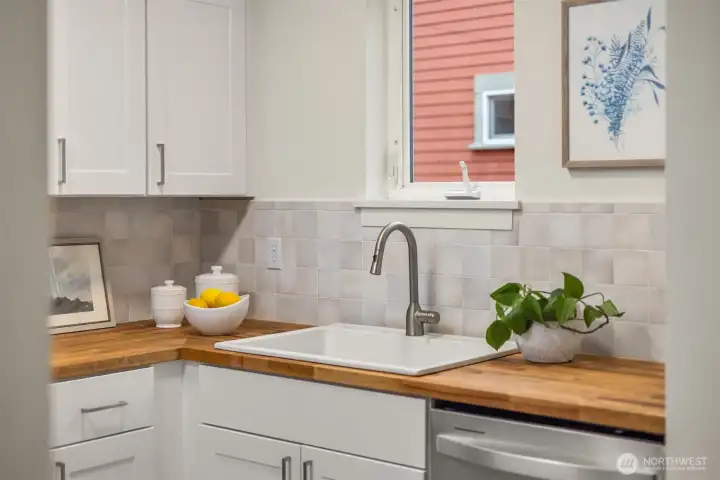 A kitchen sink window adds light and charm.