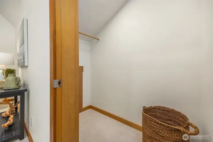 Large closet with versatile storage or office potential.