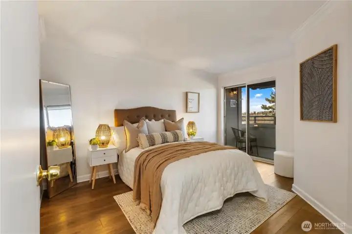 Primary bedroom with access to deck.