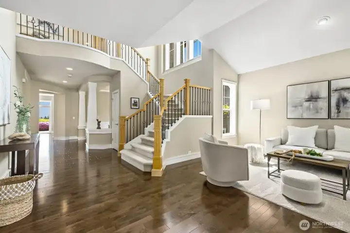 Hardwood throughout the main floor with open and bright living spaces