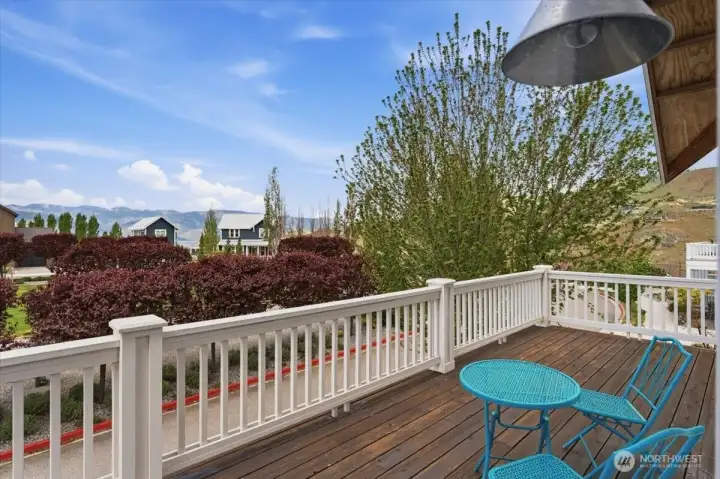 Upper Level lake view, west facing deck off Primary Bedroom.