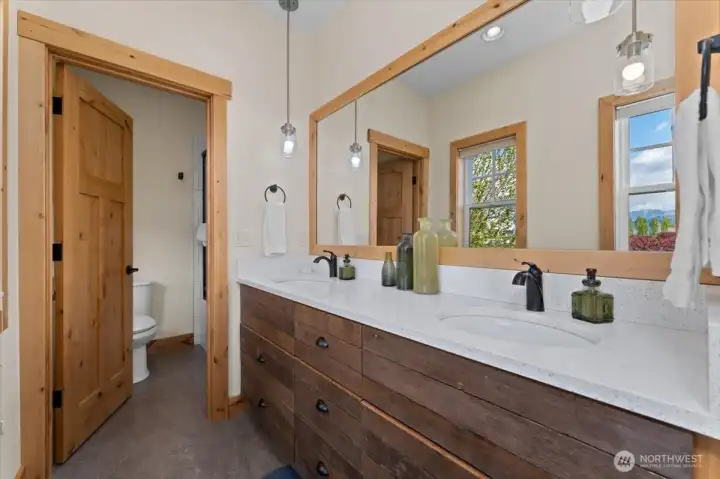 Upper level west facing Primary Bedroom ensuite bathroom.