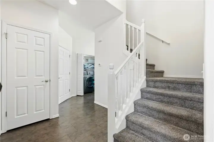 Another view of the entry featuring updated finishes and vaulted ceilings. Another view of the entry featuring updated finishes and vaulted ceilings.