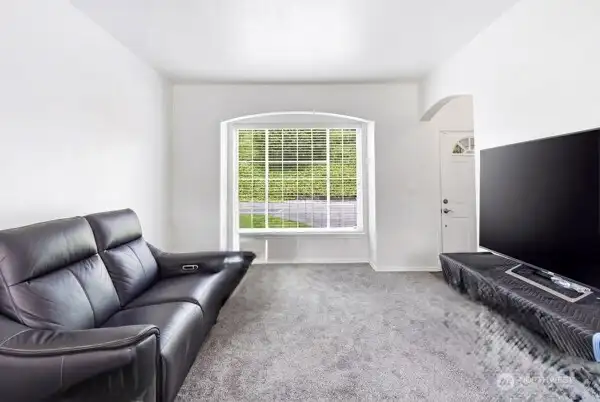 Enjoy the clean and bright living room, ready for your personal touches. Enjoy the clean and bright living room, ready for your personal touches.