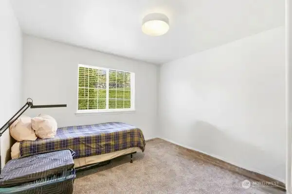 One of three bedrooms on the upper level of this lovely home. One of three bedrooms on the upper level of this lovely home.