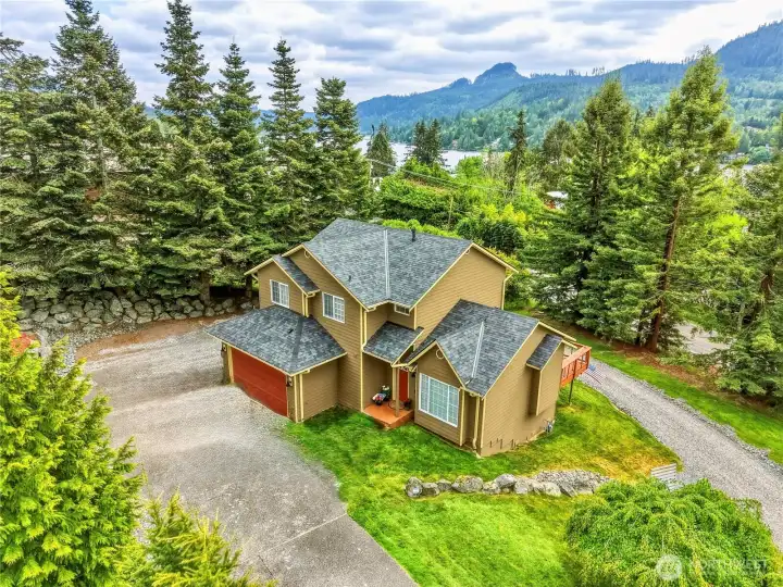 Set on a beautifully maintained ¾-acre lot with partial views of Big Lake and the surrounding mountains. Set on a beautifully maintained ¾-acre lot with partial views of Big Lake and the surrounding mountains.
