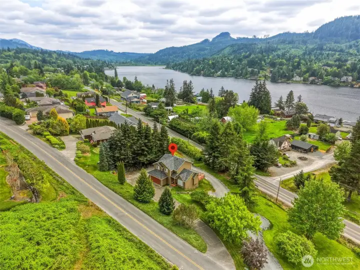 Elevated setting with partial views of Big Lake, surrounded by mature evergreens and natural beauty. Elevated setting with partial views of Big Lake, surrounded by mature evergreens and natural beauty.